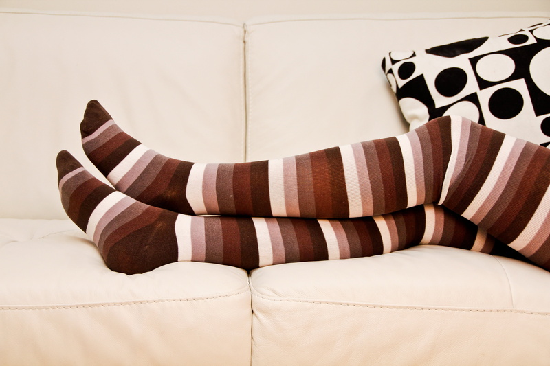 living room, indoors, crossed legs, luxury, domestic room, knee, pattern, wearing, stripped socks, sock, relaxation, high, bed, person, armchair, long socks