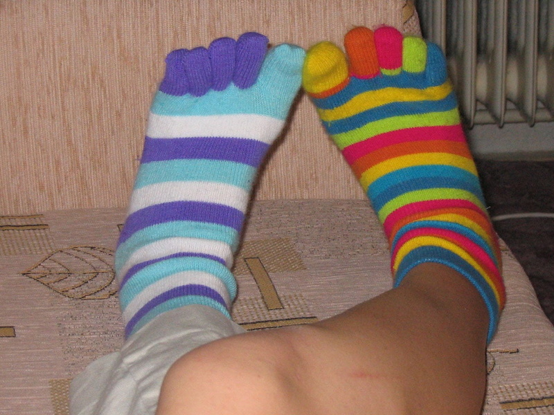 body part, sock, high angle view, wool, women, indoors, human Leg, feet, lifestyles, real people, adult, pair, relaxation, human limb, multi colored, foot