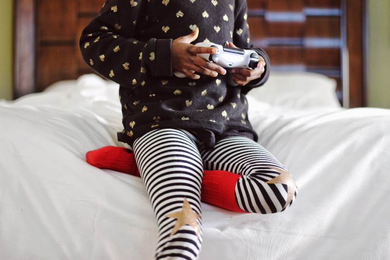 bed, sock, 5K, legging, gray, fun, sitting, girl, child, lifestyles, childhood, technology, sweater, ps, human body part, leisure activity, women, female