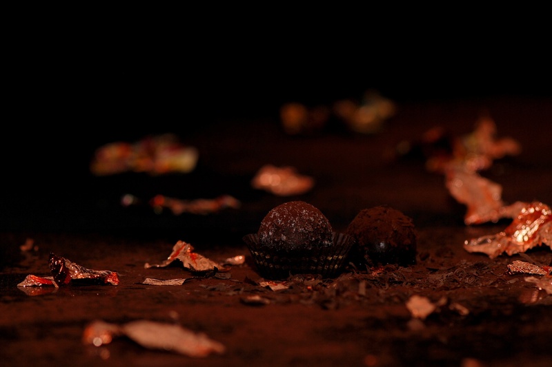 fruit, sweetness, plant part, still life, autumn, specialty, no people, black background, temptation, selective focus, candy, change, nibble, leaf, dessert