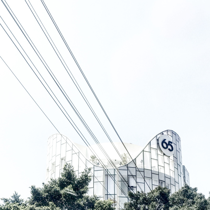 nature, electricity, tower, spire, plant, clear sky, bridge, town, tarmac, built structure, utility pole, sky, architecture, tree, building exterior, steeple