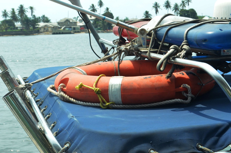close-up, yatch, nature, nautical vessel, seashore, mode of transportation, beach safety, moored, waterways, day, rope, safe swimming, no people, focus on foreground