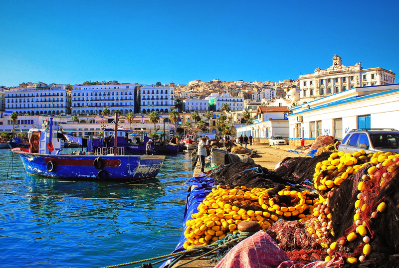 water, sunny, nautical vessel, blue, watercrafts, town, no people, palm trees, urban, travel destinations, waterfront, sea, travel, harbor, people, outdoors