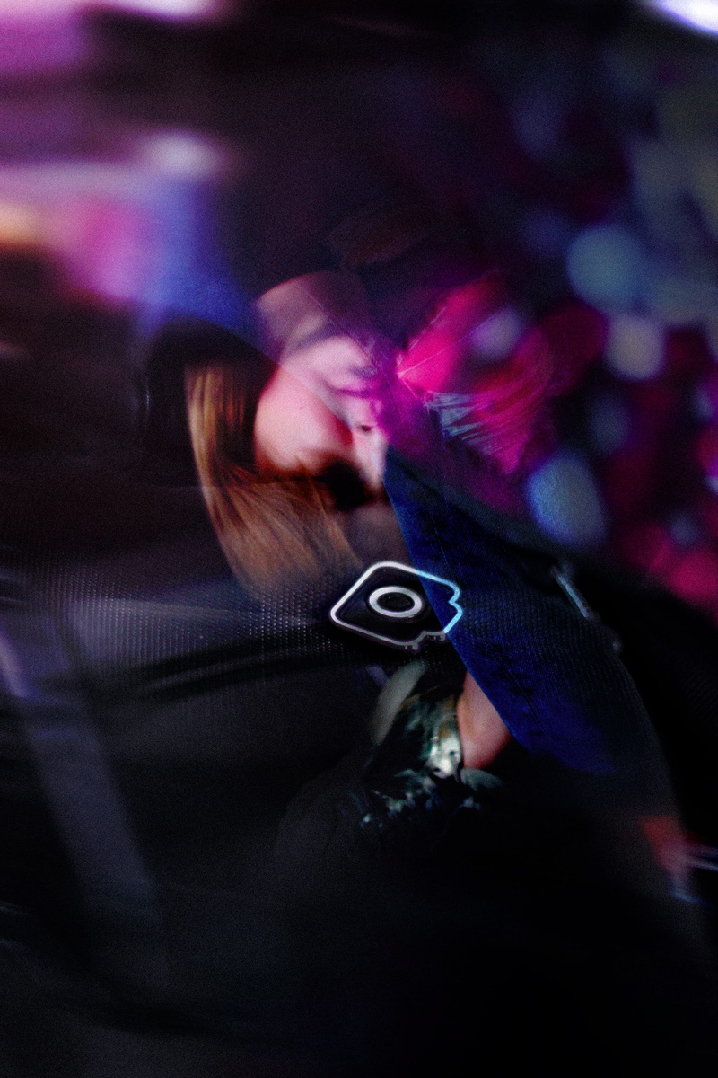human, women, night club, reflection, dance pose, communication, holding, leisure activities, motion, glass, arcade game machine, sticker, social issues