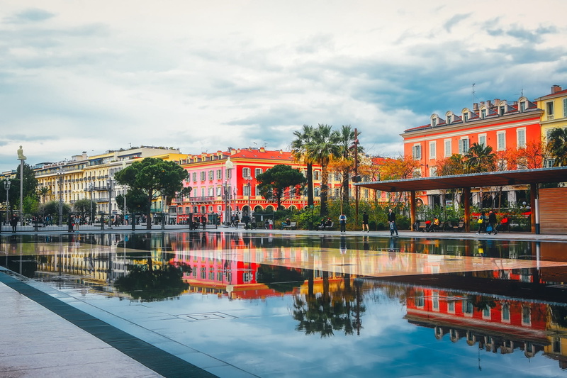 travel destinations, buildings, cityscape, palm trees, tourism, reflection, building, nature, holiday, outdoors, urban, waterfront, city, sky, no people