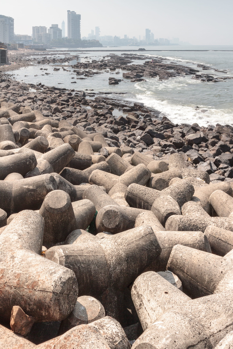 nature, beach, solid, rock, no people, india, arabian sea, beauty in nature, pebble, sea, water, architecture, day, built structure, scenics - nature, outdoors