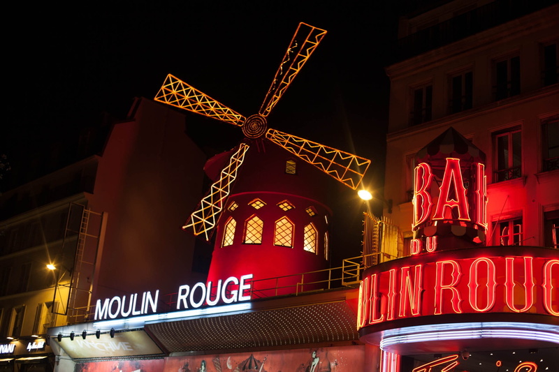 western script, building exterior, moulin rouge, evening, outdoors, club, communication, consumerism, christmas, travel destinations, illuminated, built structure