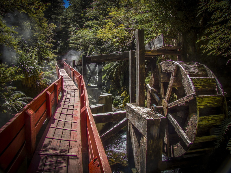chile, suspension, connection, growth, outdoors, tree, bridge, footbridge, real people, water, railing, one person, hot springs, forest, wood - material