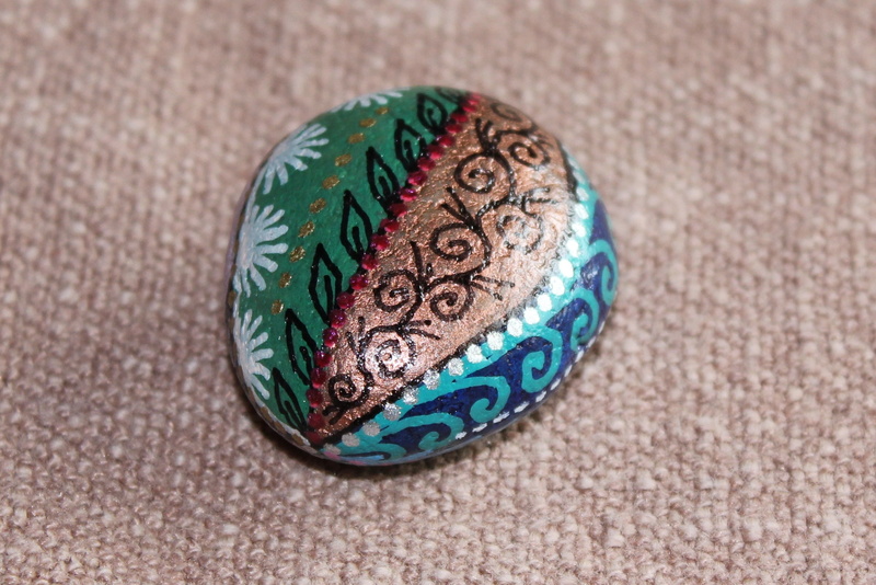 pattern, ornate, 2K, circle, single object, studio shot, design, art and craft, lucky stone, stone, indoors, blue, focus on foreground, no people, cabaret