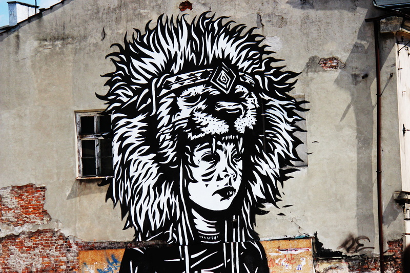 person, drawing, one man only, wearing, representation, wall, graffiti, building, murals, art, human representation, portrait, headdress, outdoors, one animal