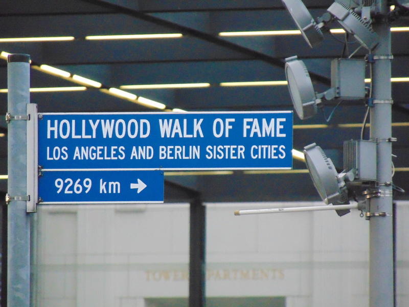 metal, architecture, hollywood, warning sign, script, text, sign, guidance, filmstudio, no people, day, information sign, indoors, non-western script, transportation