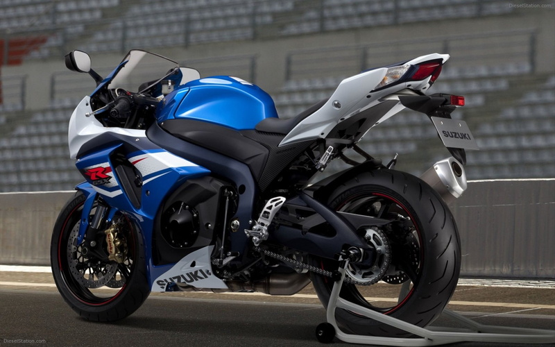 road, Suzuki, sports helmet, helmet, black, transportation, focus on foreground, day, land vehicle, parking, blue, back, crash helmet, gray, scooter, street