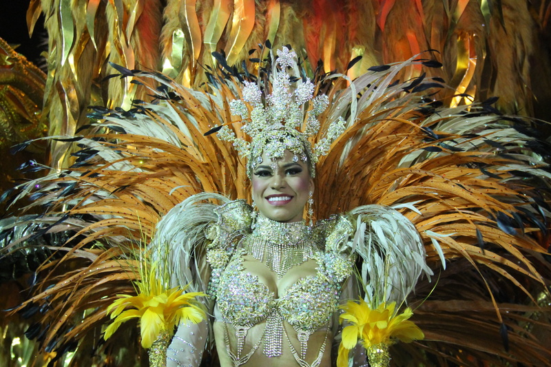 lifestyles, waist up, one person, headdress, front view, hairstyle, brazil, rio, headwear, orange, leisure activity, costume, young women, young adult