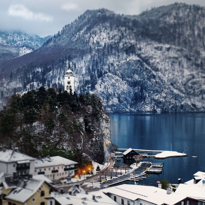 city, tree, architecture, cold temperature, religion, building exterior, nature, mountain, winter, plant, village, built structure, cold, traunsee, hill