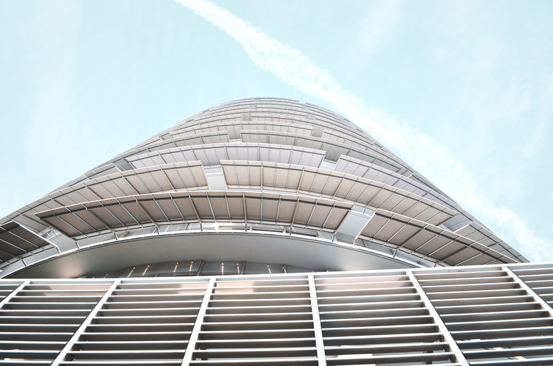 lines, architecture, building, drained, sky, skyscraper, no people, outdoors, modern, capitol records building, sunlight, built structure, office building exterior
