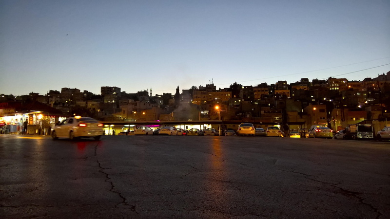 built structure, sunlight, city, no people, mode of transportation, outdoors, dusk, clear sky, copy space, cityscape, amman city center, road, nature, building