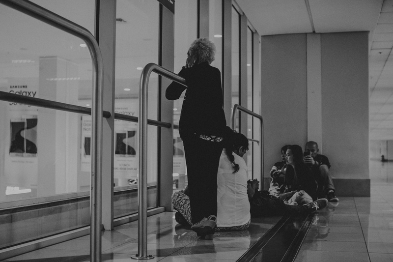 naia terminal 3, real people, reflection, waiting, mode of transportation, adult, people, philippines, scene, side view, transportation, men, indoors, casual clothing