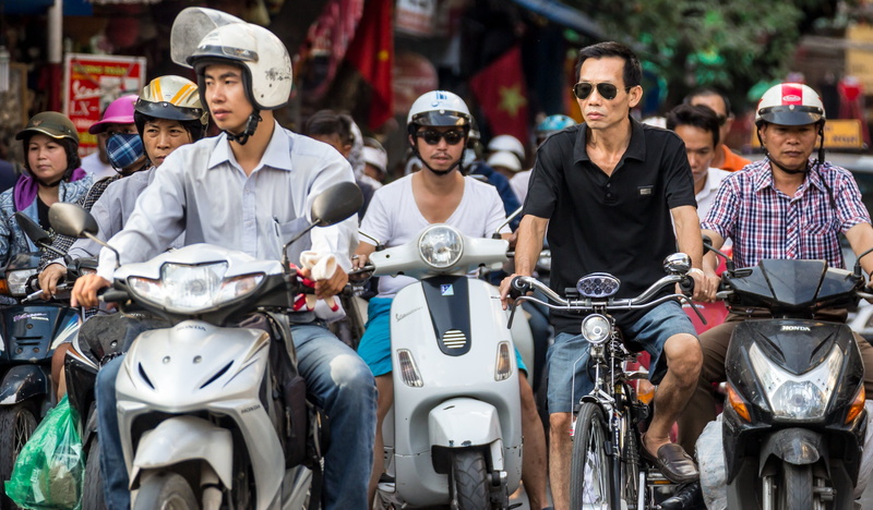 crash helmet, black, wearing, bicycle, outdoors, transportation, men, riding, traffic, looking at camera, young adult, young men, sports helmet, mode of transportation