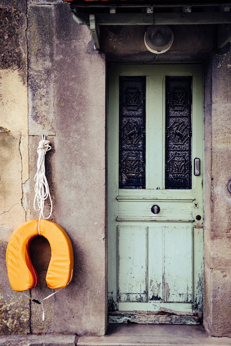 wood - material, horseshoe, house, retro, entrance, no people, closed, security, building, plant, day, clothing, orange color, window, apparel, architecture