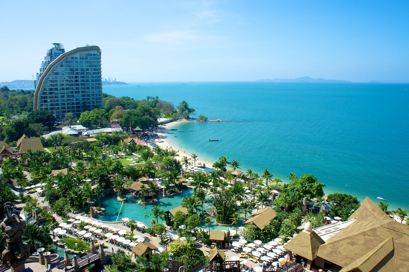 city, sky, swimming pool, high angle view, travel destinations, nature, land, sea, centara grand mirage hotel, tree, bay, travel, outdoors, architecture