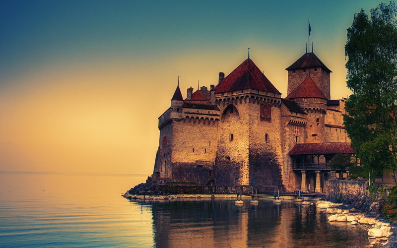 the past, outdoors, travel destinations, old building, rock, building exterior, sky, nature, water, reflection, Lake Geneva, Switzerland, sunset, built structure