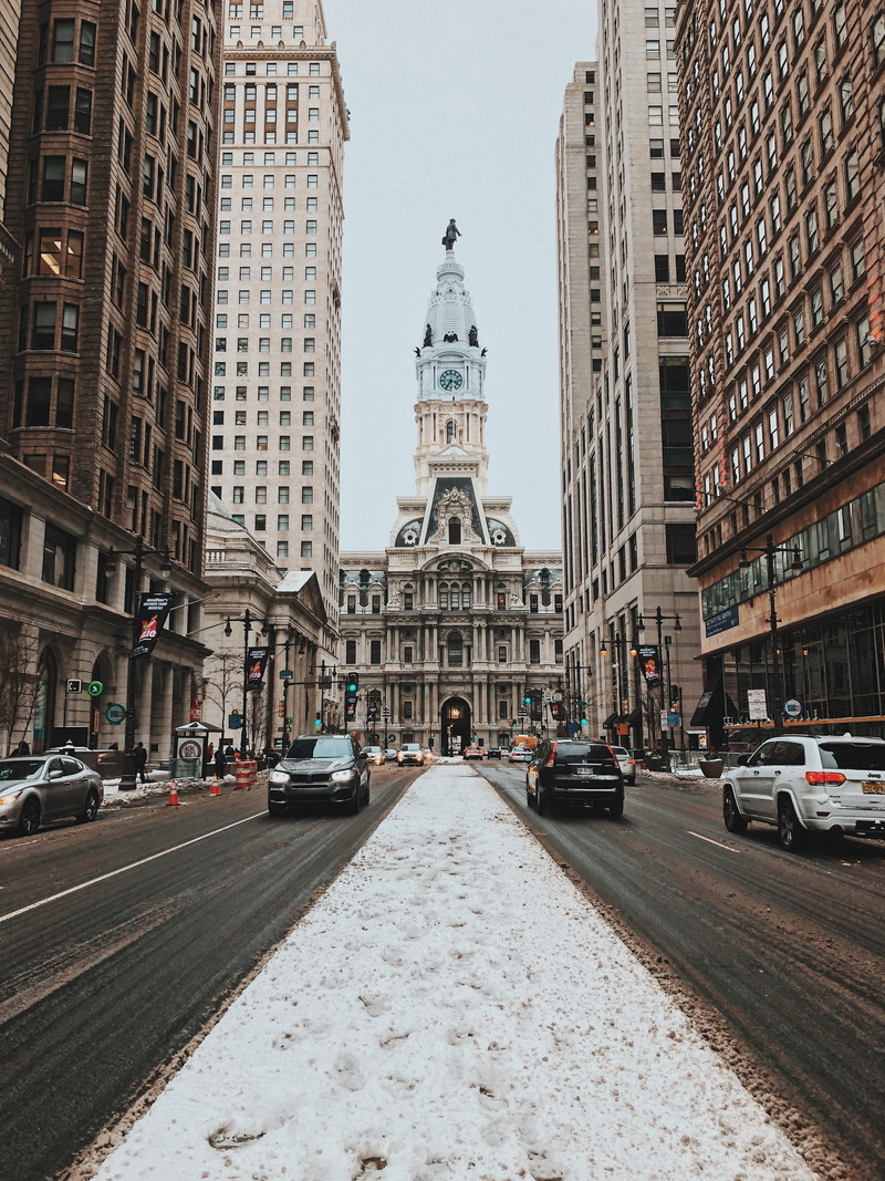 spire, snow, outdoors, road, architecture, building, street photography, mode of transportation, city, street, travel destinations, building exterior, tall - high