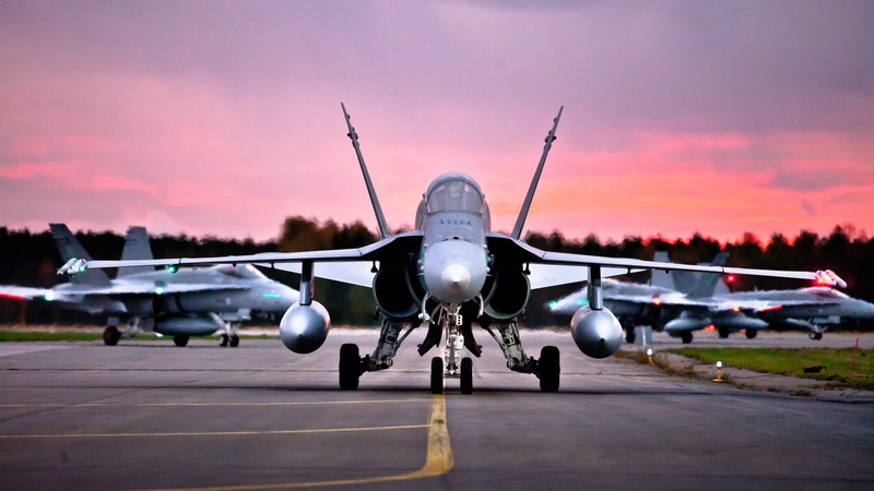 airfield, transportation, jet engine, airport runway, no people, plane, landing - touching down, military finnish air force mcdonnell douglas f a 18 hornet