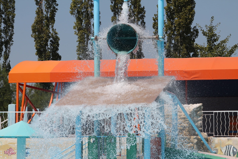 flowing, spraying, no people, nature, water slide, flowing water, swimming pool, orange color, long exposure, 4K, blurred motion, water park, equipment
