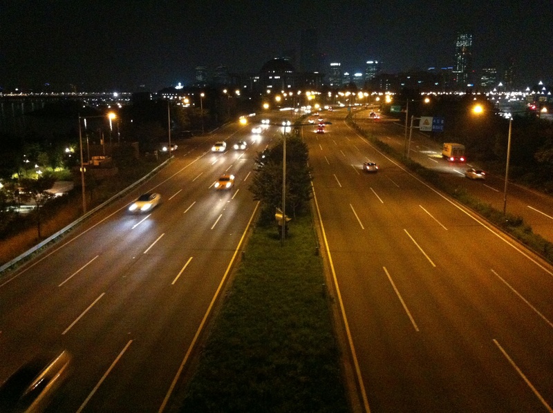 car, direction, building exterior, built structure, night, city, motion, street, illuminated, land vehicle, street light, marking, 2K, motor vehicle, road