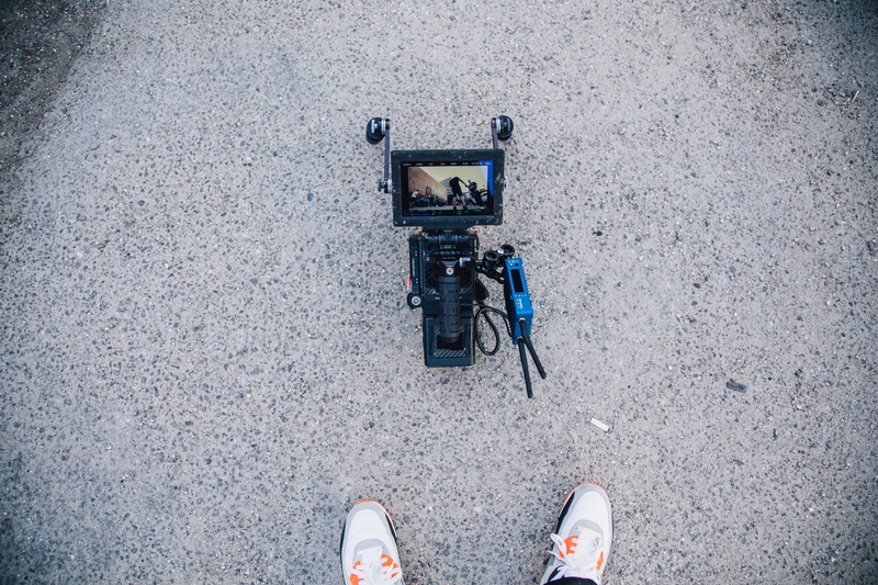 road, transportation, filmography, day, arri, city, unrecognizable person, human foot, cinematography, shoe, real people, land vehicle, construction industry