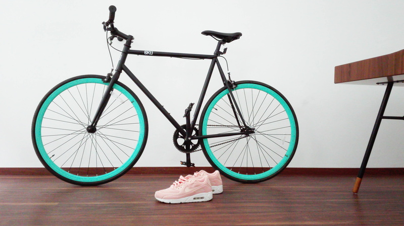 spoke, tire, pair, wood - material, stationary, max, wheel, pink, no people, seat, athletic, land vehicle, black, sneaker, lane, shoes, command, mode of transportation