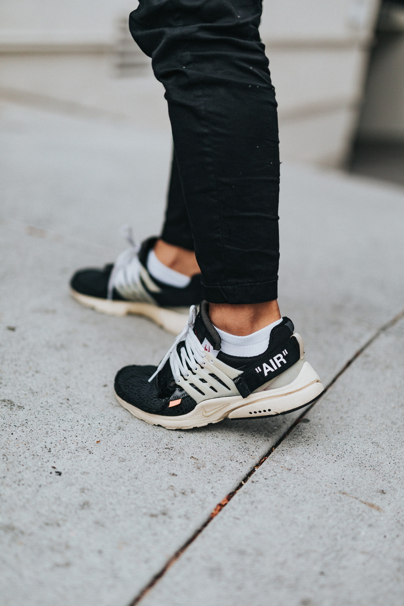 leisure activity, human body part, air, sneaker head, pair, human leg, paving stone, hypebeast, standing, low section, shoes, nike shoes, 5K, black, footpath