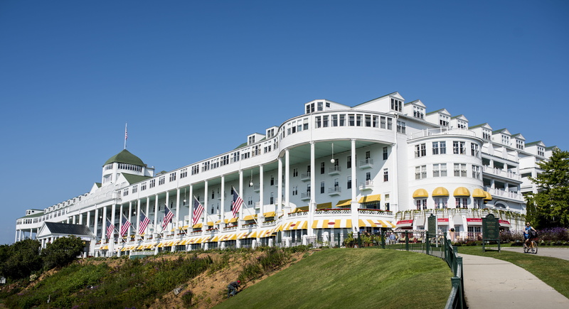 hotel, building, heritage, plant, vacation, clear sky, mackinac island, history, blue, residential district, the grand, monument, tourism, travel, transportation