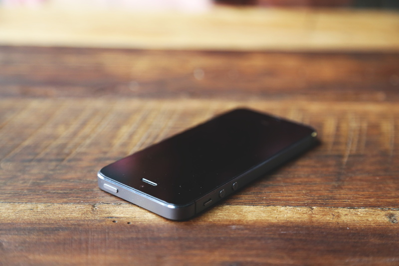 connection, technology, touchscreen, brown, wood grain, close-up, single object, portability, 5K, surface, telephone, wood - Material, table, selective focus