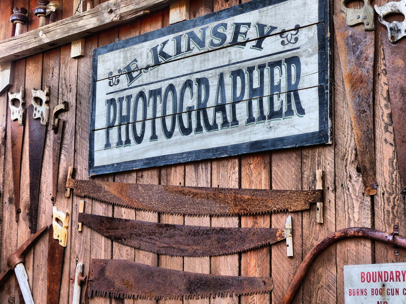 entrance, wall - building feature, metal rusty, old wooden sign, rust, erosion, day, canada, british columbia, outdoors, no people, heritage, wild west