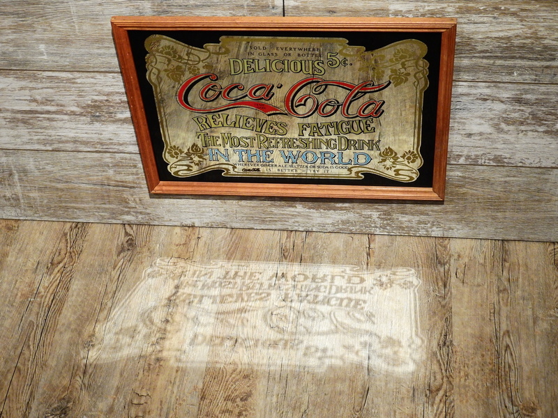 script, drink, sugar, coke, wall - building feature, text, close-up, the past, wood - material, indoors, coca cola, old, advertising sign, history, craft