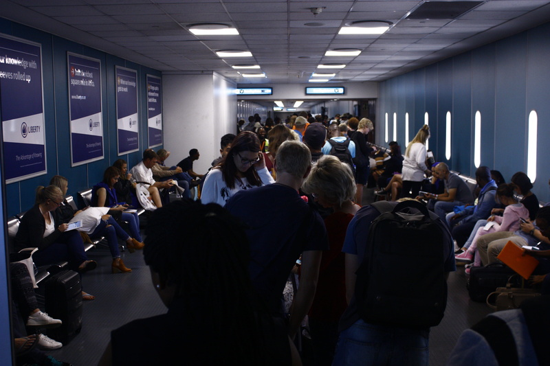 airline, ceiling, planes, kulula, women, line, emirates, technology, leisure activity, large group of people, sitting, indoors, crowd, 4K, adult, illuminated