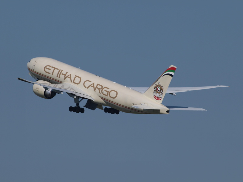 single object, side view, photo, Cargo, flying, Etihad Airways, commercial Airplane, 2K, white, on the move, mode of transportation, outdoors, government
