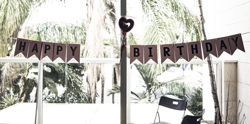 near, focus on foreground, birthday, grass, communication, yard, celebrate, 8K, information, occasion, poster, tree, western script, collage, chair, flag