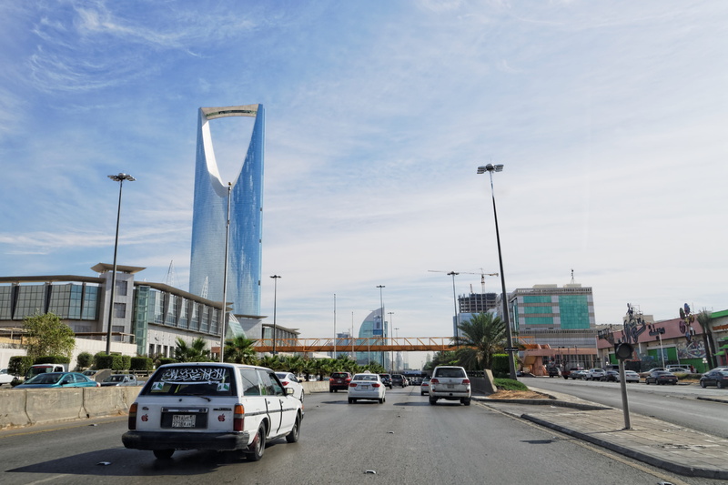 day, bridge, building exterior, skyscraper, mode of transport, urban Scene, City, land vehicle, outdoors, nature, connection, road, urban landscape, multiple lane highway