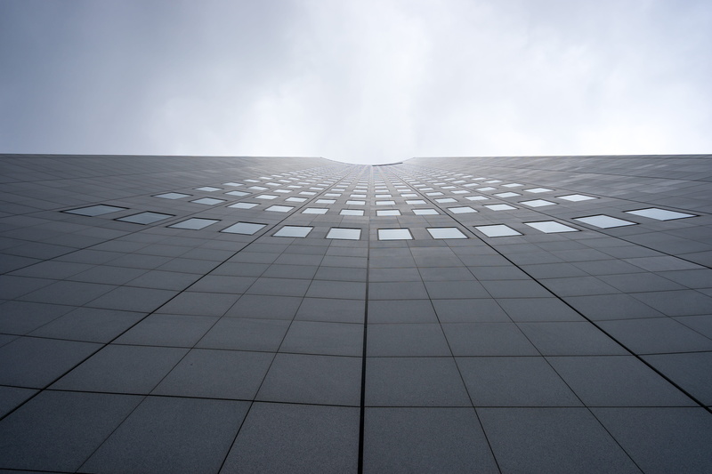 building, 5K, day, holes, no people, skyscraper, lines, cloud - sky, directly below, curved, converging, small, outdoors, nature, windows, overcast, city