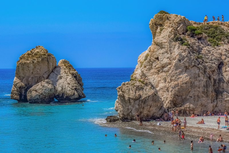 scenics - nature, tranquil scene, cyprus, water, solid, scenery, tourism, stone, blue, aphrodites rock, nature, sky, day, rock - object, travel, rock formation