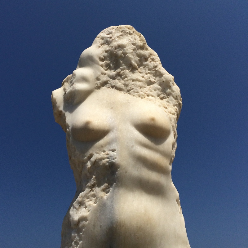 stone, female likeness, statue, nature, representation, creativity, island, clear sky, low angle view, day, human representation, greece, cyclades, male likeness