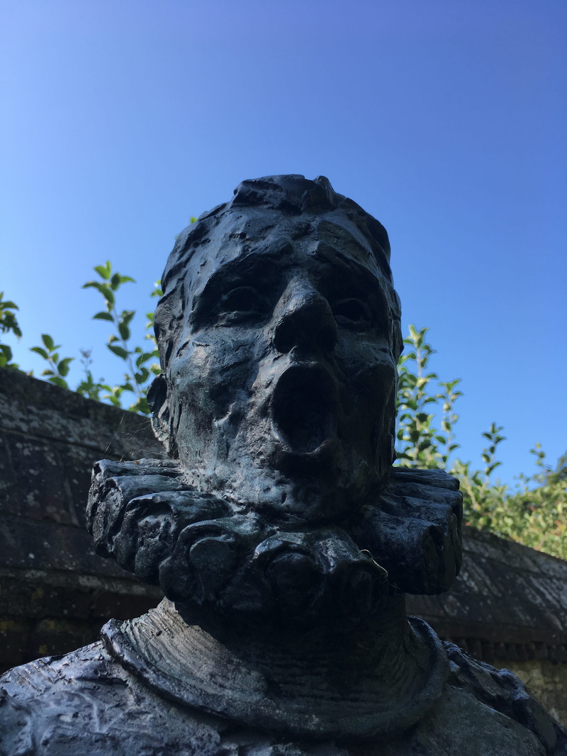 nature, human representation, no people, low angle view, male likeness, east sussex, close-up, history, lewes, blue, day, representation, outdoors, southover grange in lewes