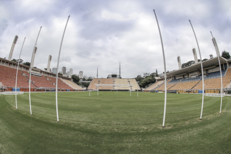 football game, team sport, architecture, 5K, day, playing field, green color, nature, grass, football, estadio, cloud - sky, football field, game, absence