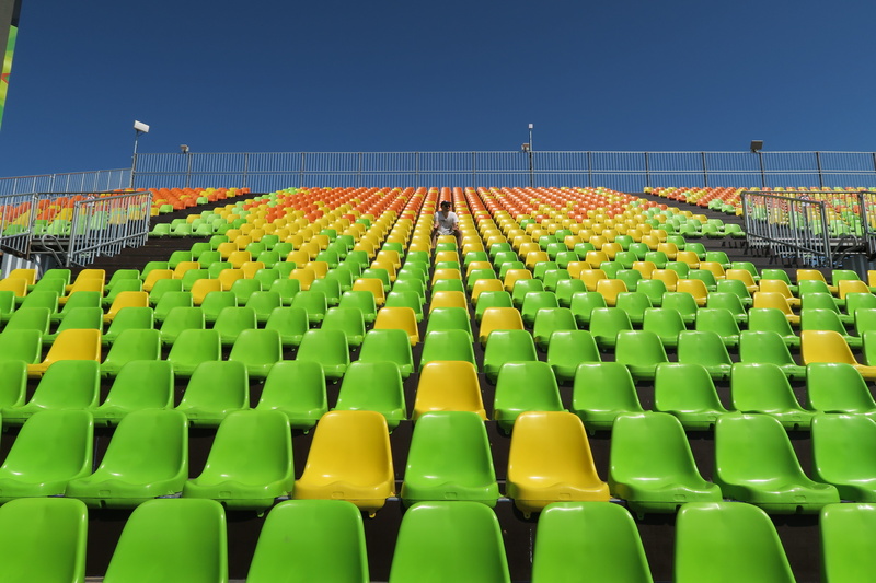 seat, no people, abundance, clear sky, soccer, sport, empty, chair, olympics, repetition, green color, large group of objects, absence, the olympics, in a row