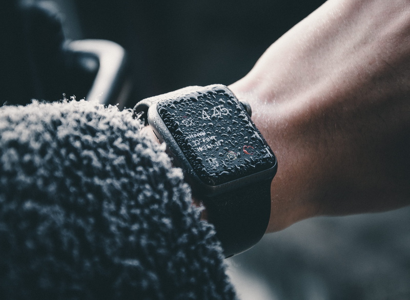 water, wet, indoors, personal accessory, black, wristwatch, person, technology, adult, real people, human body part, wrist, hand, wearing, men, lifestyles