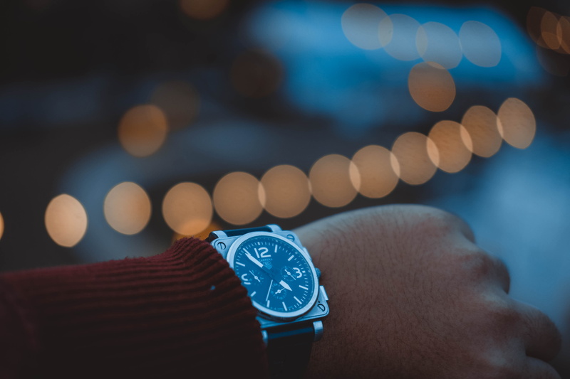 technology, holding, human hand, lifestyles, night, bokeh, selective focus, human finger, photography, wearing, illuminated, hand, silver, men, jumper