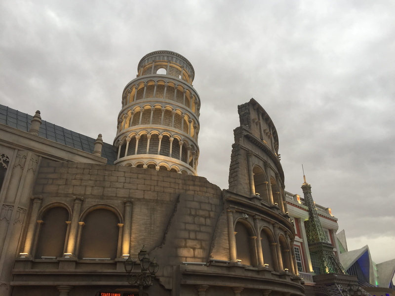 building exterior, replicate, colosseum structure, belief, low angle view, leaning tower of pisa replicate, town, united arab emirates, sky, spire, architecture