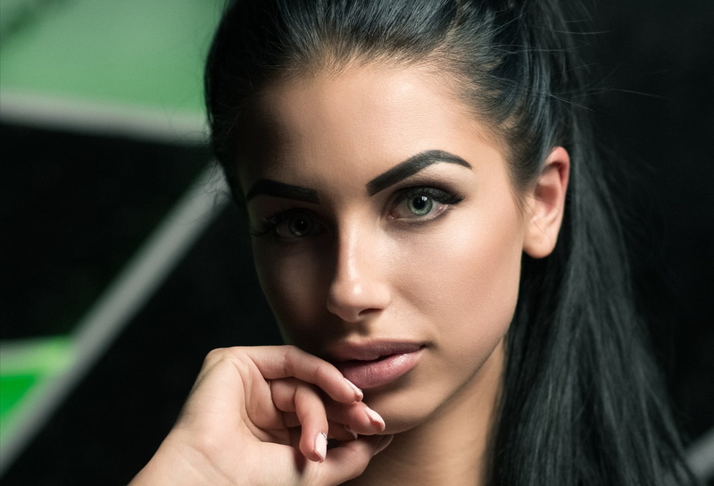 human Face, body part, human Skin, human hair, one Woman Only, green eyes, manicures, hairstyle, hair, black hair, adult, glamour, looking, hand, looking At Camera